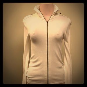 White zip up sweater by Zara.